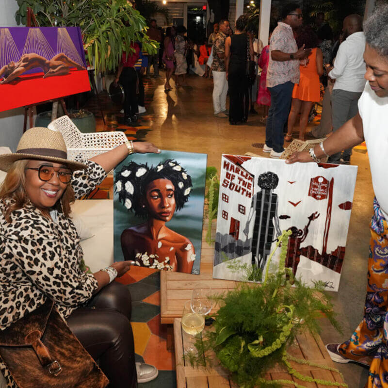 Attendees showing off art