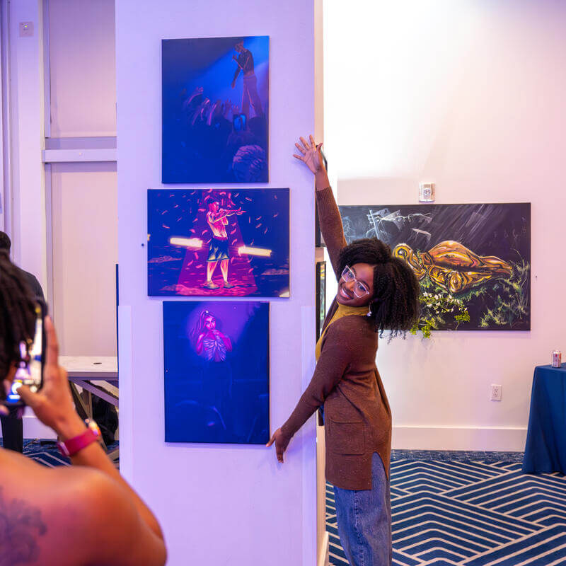 Student showing art