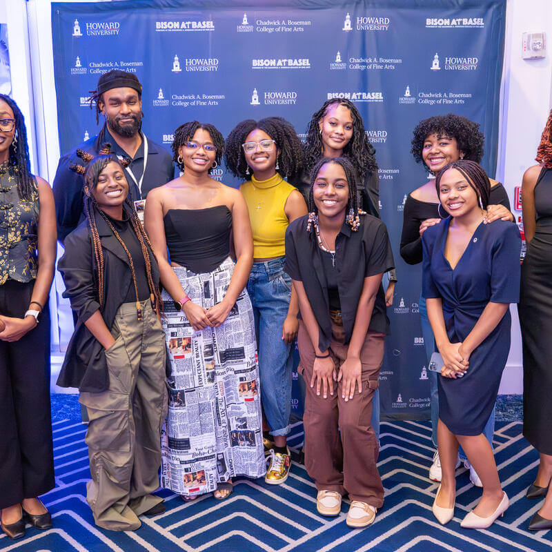 10 attendees posing for a photo