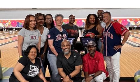 HUAC Trenton members posing for a photo at a bowling alley