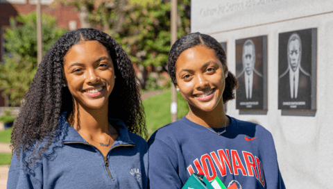 Students posing for Giving Tuesday photo.