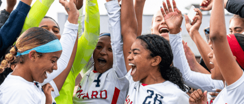 Cropped photo of Howard women's soccer team celebrating their championship