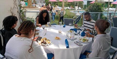Attendees around a table