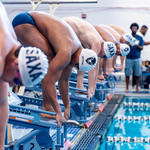 Swimmers on platforms