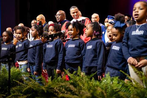 Kids singing at Charter Day Convocation