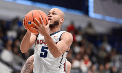 Men’s basketball player going for a layup