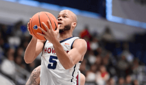Howard player fighting for a layup