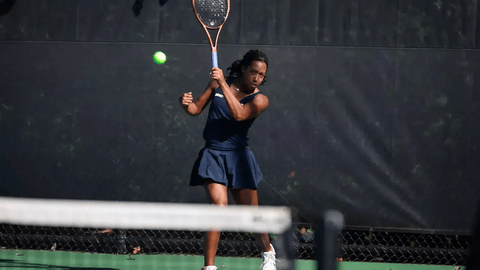 Women's tennis player with a forehand